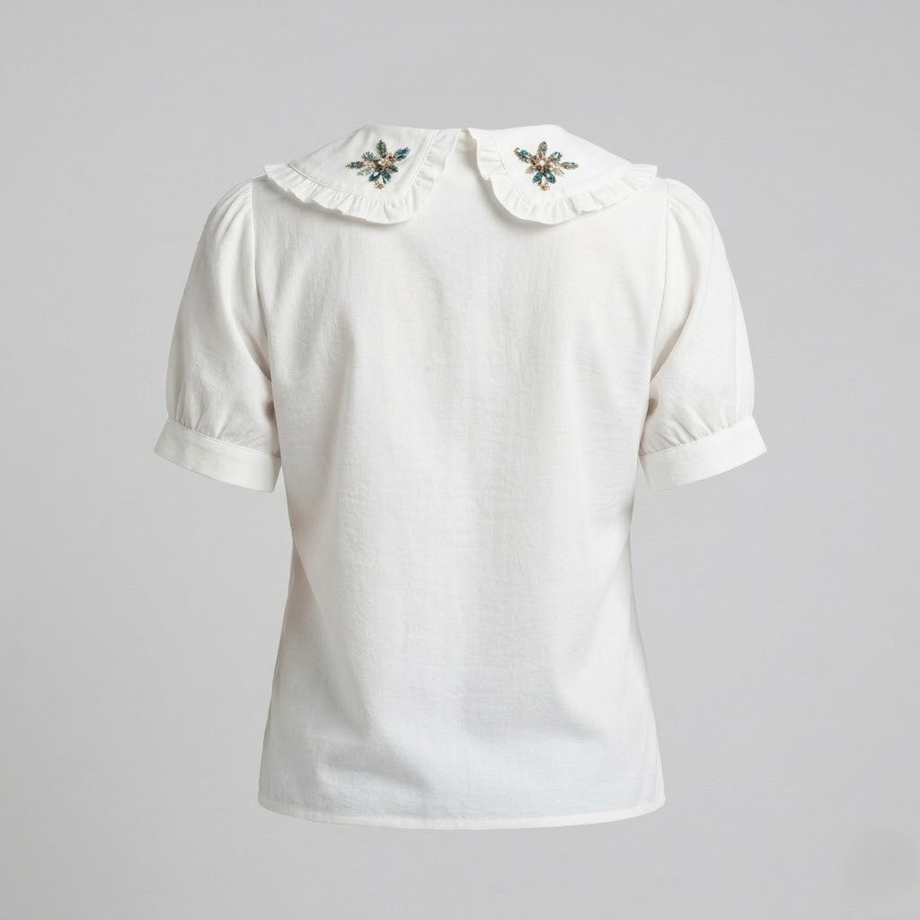Weiße Baumwollbluse mit Stickerei